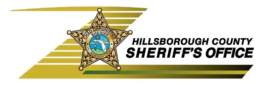 Hillsborough County Sheriffs Office logo featuring a gold star badge with a central seal, next to bold text reading Hillsborough County Sheriffs Office on a gold and green striped background, often seen on their vehicles and Mobile Command Center.