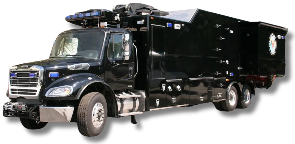 Large black Army North 1 truck with a boxy, elongated rear compartment, multiple wheels, side compartments, and official-looking insignia on the back section, photographed from a front-side angle.