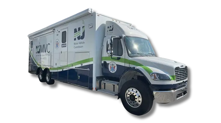 A large white and blue truck labeled NJ MVC with green stripes, logos, and text indicating it is a Motor Vehicle Commission vehicle, similar in function to a Volusia County Sheriffs Office Public Safety Vehicle.
